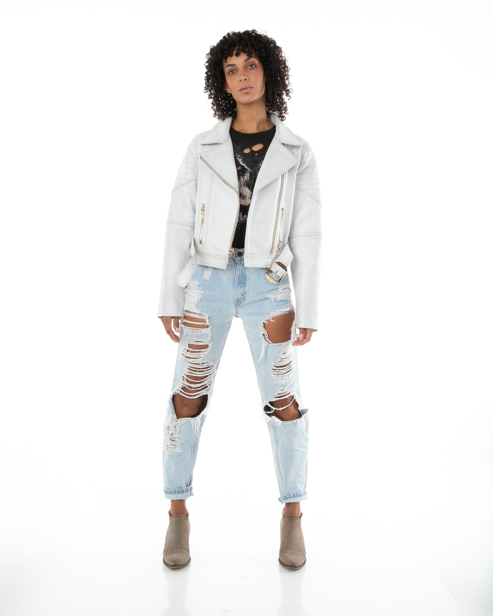 Front of female model wearing Prince leather jacket