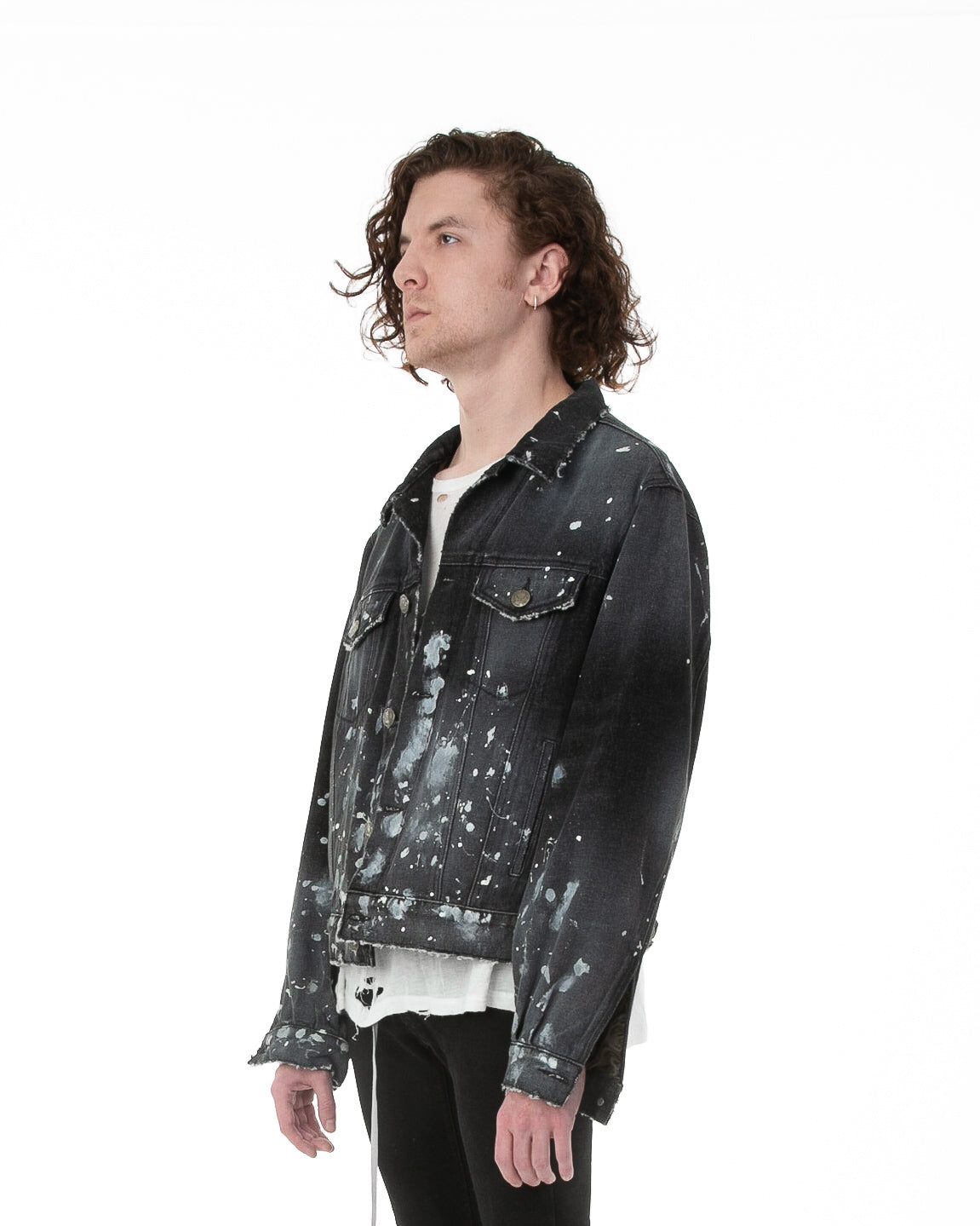 Side of male model wearing Painter's Denim jacket