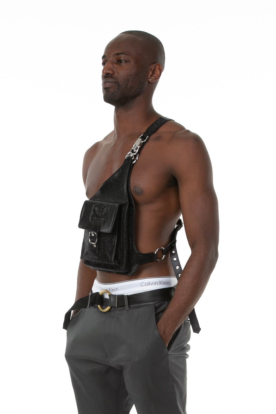 Side of male model wearing Holster Bag in Stingray