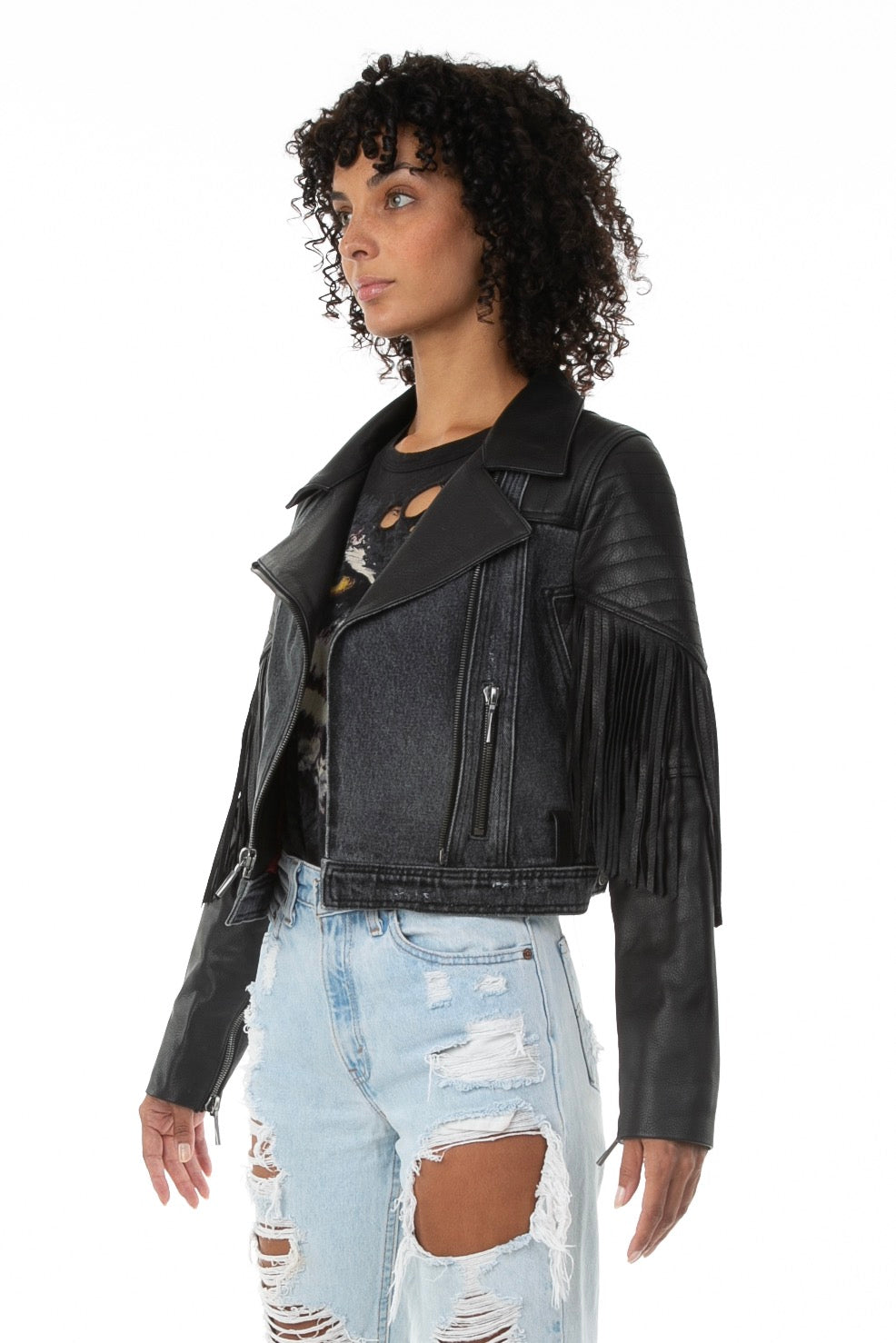 Side of female model wearing La Matadora leather jacket