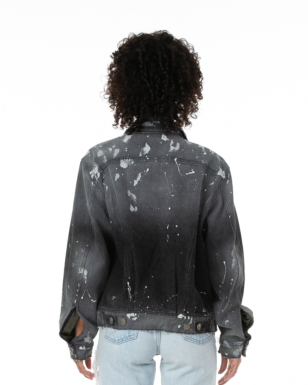 Back of female model wearing Painter's Denim jacket