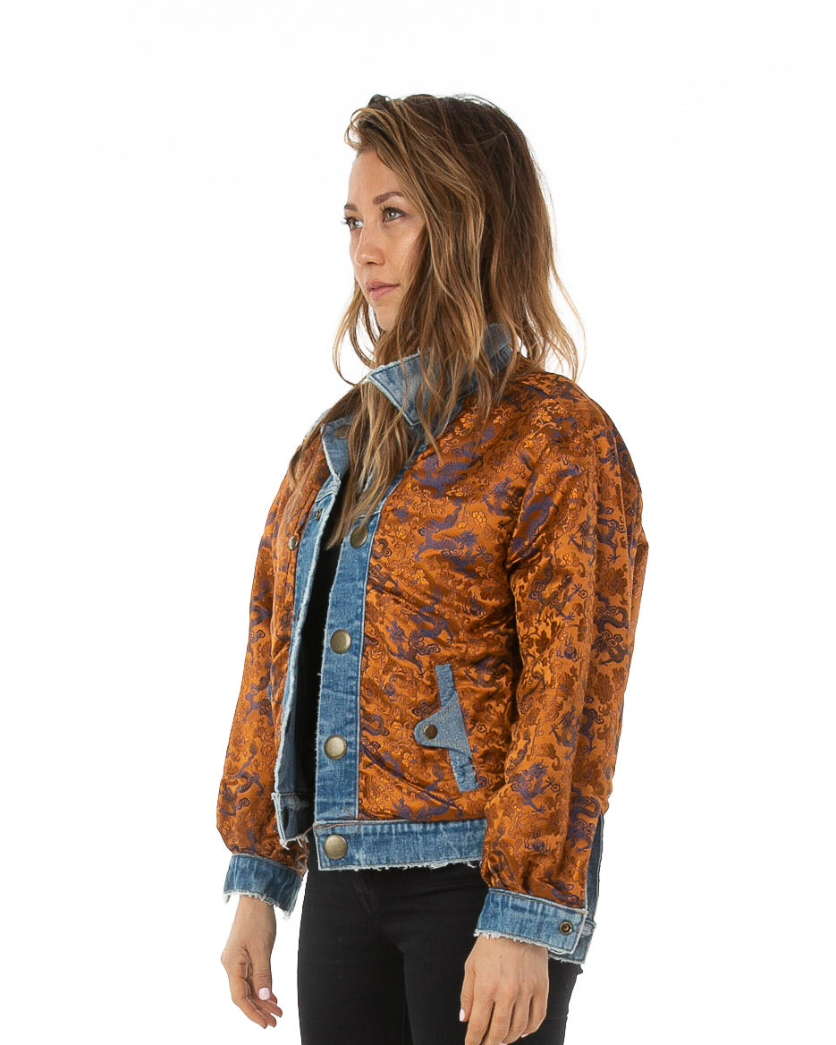 Side of female model wearing Dynasty Reversible Denim jacket