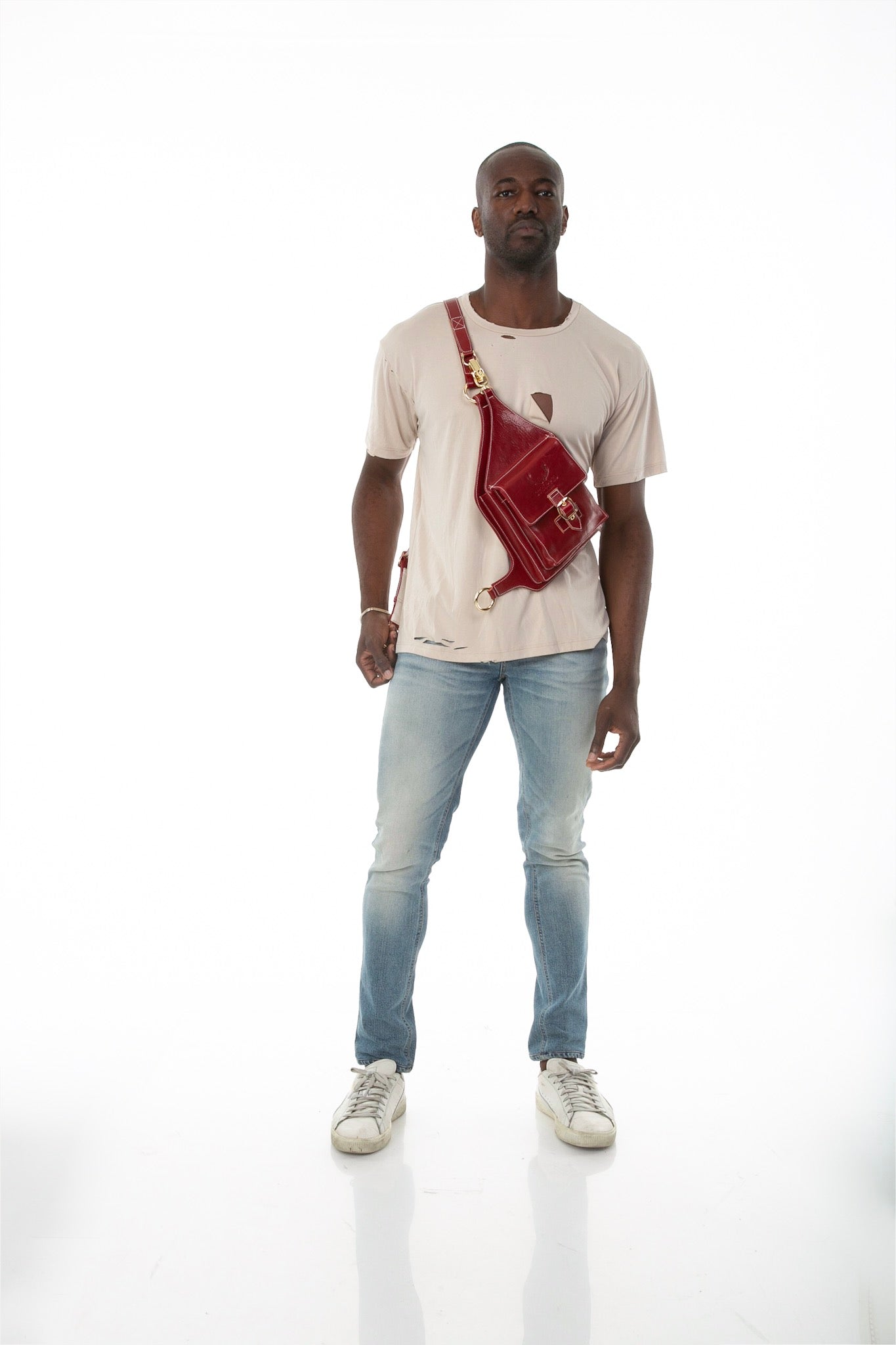 Front of male model wearing Holster Bag in Red