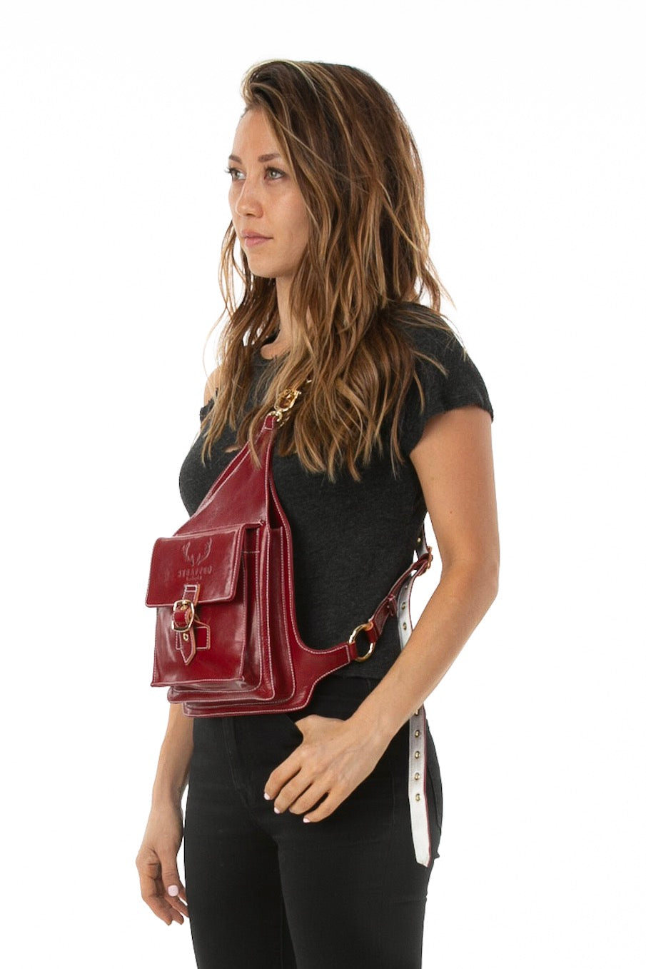 Side of female model wearing Holster Bag in Red