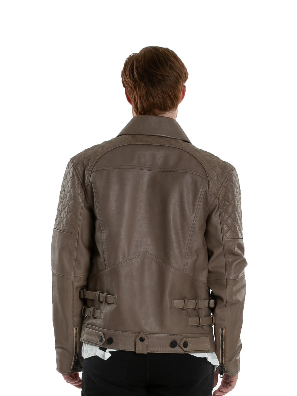 Backside of male model wearing Grindstone leather jacket